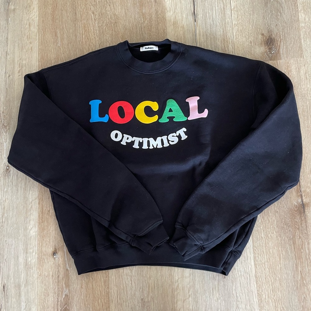 Madhappy “Local Optimist” sweater in Black with colorful writing